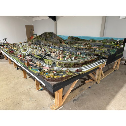 63A - OO Gauge scale model railway layout with detailed scenery including bridges, castles, stations, vehi... 