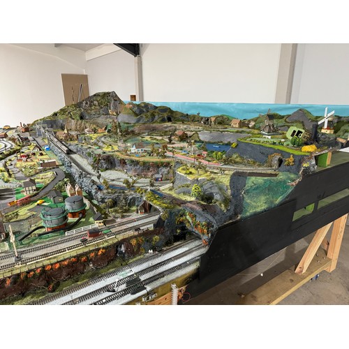 63A - OO Gauge scale model railway layout with detailed scenery including bridges, castles, stations, vehi... 