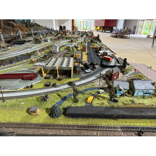 63A - OO Gauge scale model railway layout with detailed scenery including bridges, castles, stations, vehi... 