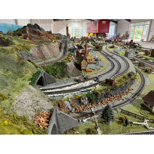 63A - OO Gauge scale model railway layout with detailed scenery including bridges, castles, stations, vehi... 