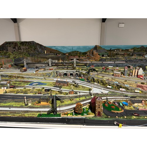 63A - OO Gauge scale model railway layout with detailed scenery including bridges, castles, stations, vehi... 