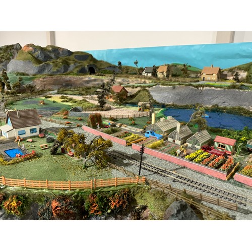 63A - OO Gauge scale model railway layout with detailed scenery including bridges, castles, stations, vehi... 