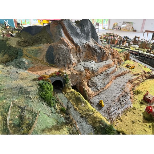 63A - OO Gauge scale model railway layout with detailed scenery including bridges, castles, stations, vehi... 