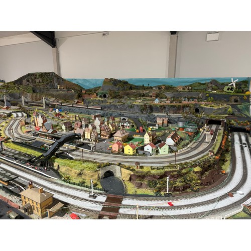 63A - OO Gauge scale model railway layout with detailed scenery including bridges, castles, stations, vehi... 