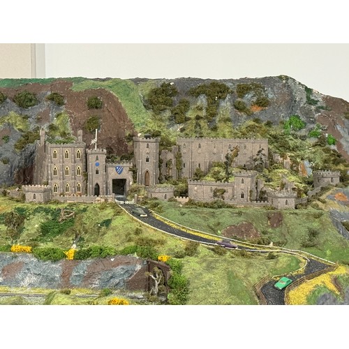 63A - OO Gauge scale model railway layout with detailed scenery including bridges, castles, stations, vehi... 