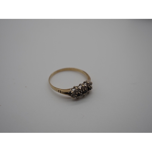 332A - 9ct Gold sapphire and white stone ring