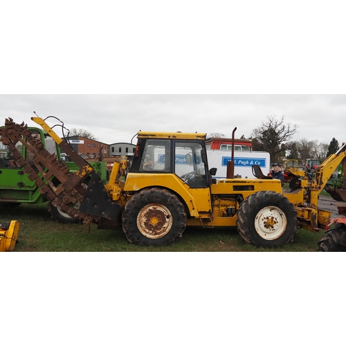 1645 - International tractor with Swan Engineering rear rotary chain trencher, front hoe and blade. Folder ... 