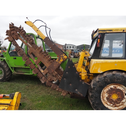 1645 - International tractor with Swan Engineering rear rotary chain trencher, front hoe and blade. Folder ... 