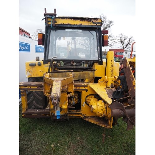 1645 - International tractor with Swan Engineering rear rotary chain trencher, front hoe and blade. Folder ... 