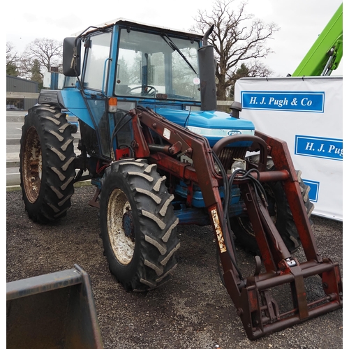 1731 - Ford 4610 4wd tractor. Starts and drives. C/w power loader, showing 5241 hours. Reg. V729 TUJ. Key i... 