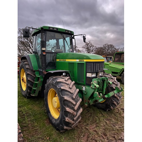 1625 - John Deere 7710 tractor. Runs and drives. Showing 9715 hours. Fitted with front linkage and PTO. New... 