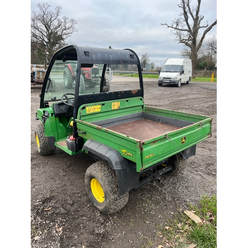 1723 - John Deere HPX 4x4 diesel gator. 2006. Runs but needs attention. Possibly gasket issue. Key in offic... 