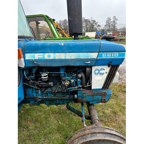 1623 - Ford 6610 tractor. Runs and drives. Fitted with pick up hitch and good tyres. Showing 6148 hours. Re... 