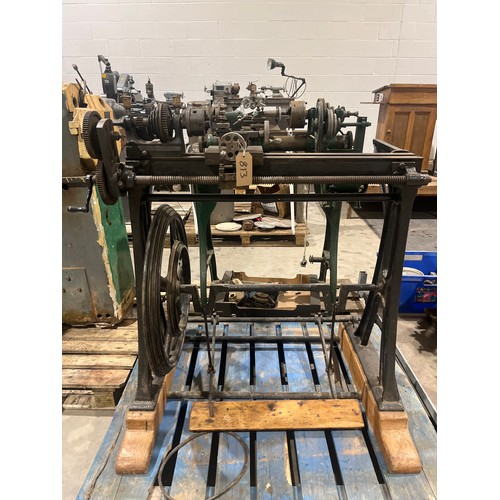 390A - Early treadle lathe with sliding bed assembly