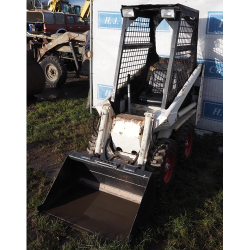 1512 - Bobcat 313 skid steer loader. Runs and drives