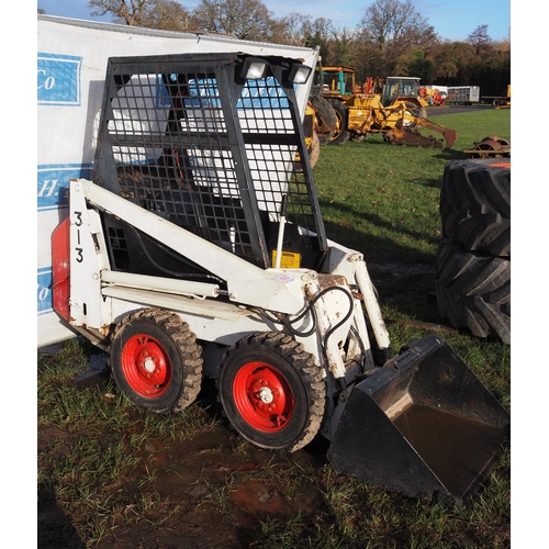 1512 - Bobcat 313 skid steer loader. Runs and drives