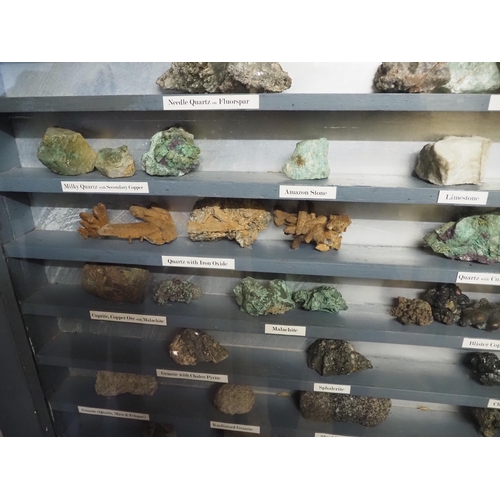 85 - Display cabinet of mixed rocks