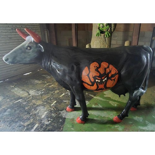 380 - Fibreglass/resin cow ornament 9'