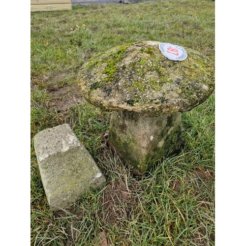 487 - Concrete saddle stone and saddle stone base