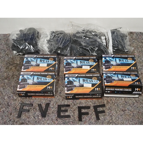 681 - Reversing camera kits and assorted number plate letters