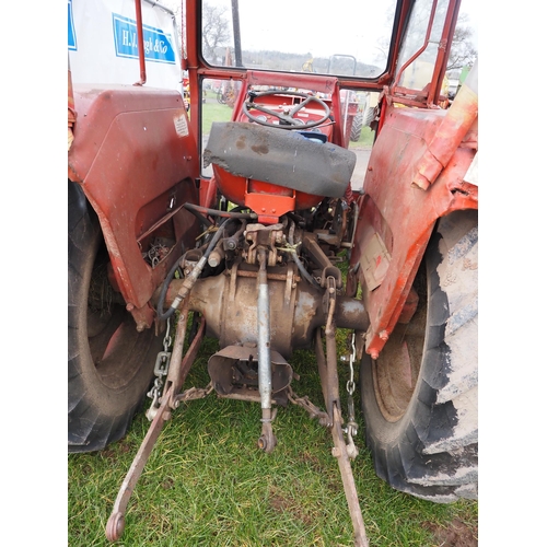 1603 - Massey Ferguson 135 tractor. runs and drives, off farm. Showing 9870 hours. C/w front hydraulic lift... 