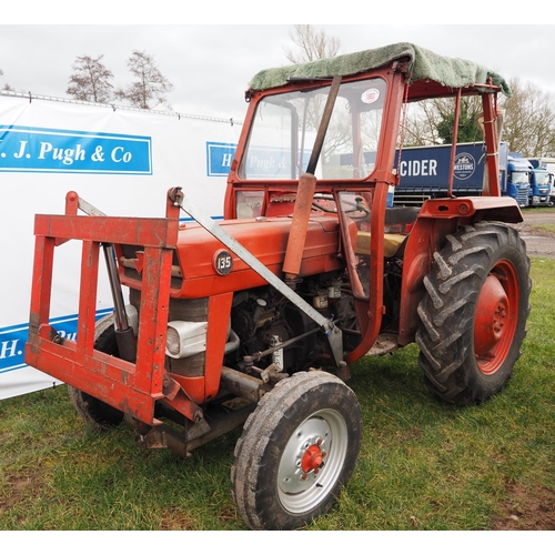 1603 - Massey Ferguson 135 tractor. runs and drives, off farm. Showing 9870 hours. C/w front hydraulic lift... 