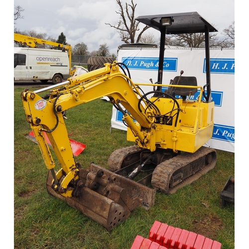 1727 - Nissan N120 1.5 ton mini digger, 1990. C/w 3 buckets. Starts, runs and drives. Key in office