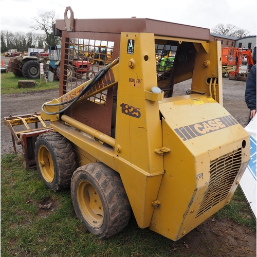 1732 - Case 1825 skid steer with muck fork. Key in office