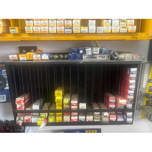 Spark plugs on rack