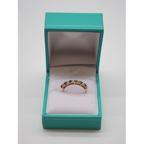 9ct Gold emerald & white stone ring