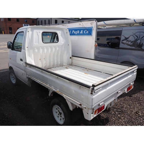 3039 - Suzuki drop side van. Showing 38,850 km. Import documents and key in office