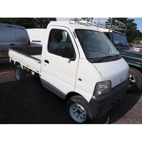 3039 - Suzuki drop side van. Showing 38,850 km. Import documents and key in office