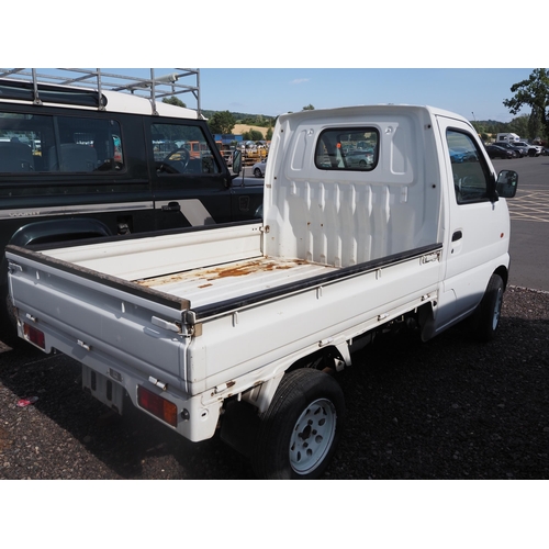 3039 - Suzuki drop side van. Showing 38,850 km. Import documents and key in office