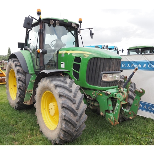 John Deere 7530 tractor. Front linkage and PTO. No rear linkage. Key in office