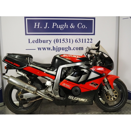Suzuki GSXR 400 motorcycle. Runs but requires a battery and has