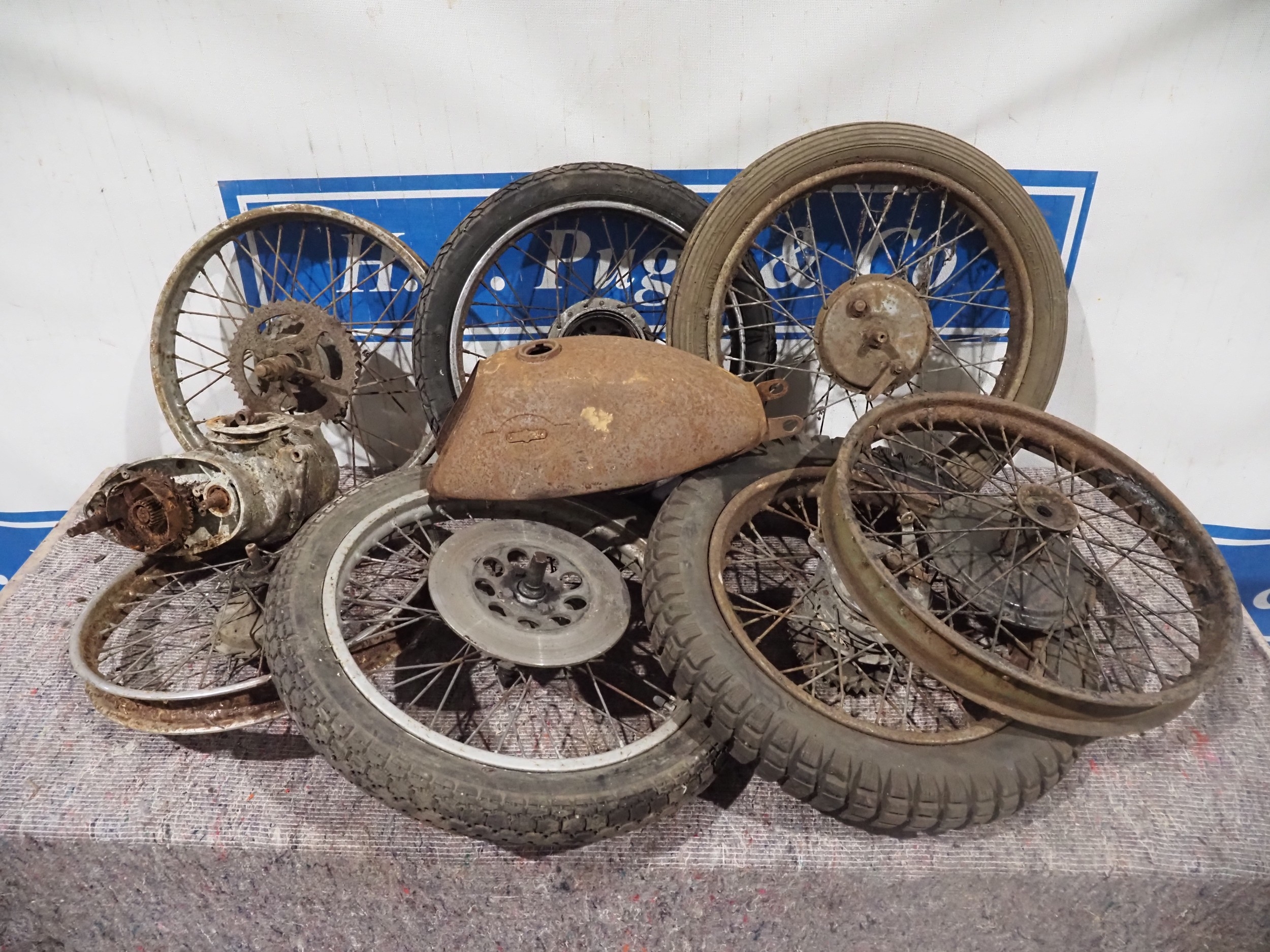 Assorted wheels and engine parts