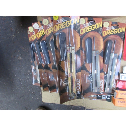 Oregon chain saw chains, file guides, sprocket nose kits