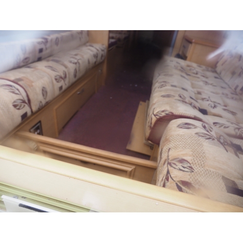 3013 - Abbey Freestyle 520E 4 berth caravan. 2005. Large lounge area that converts into a king size bed. Si... 