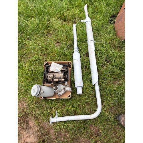 10 - Ferguson spares to include, downswept exhaust, water pump, dynamos, etc.