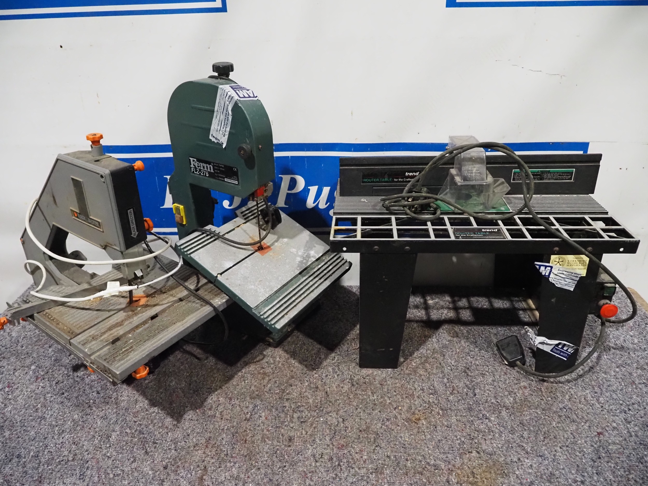 Ferm bandsaw, Trend router table and 1 other bandsaw