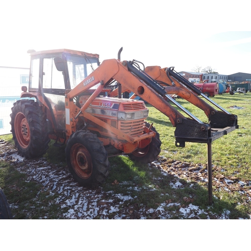 1662 - Kubota L4150 4wd tractor. Showing 5082 hours. C/w hydraulic shuttle, Kubota loader and spike. Key in... 