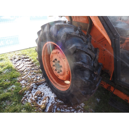1662 - Kubota L4150 4wd tractor. Showing 5082 hours. C/w hydraulic shuttle, Kubota loader and spike. Key in... 