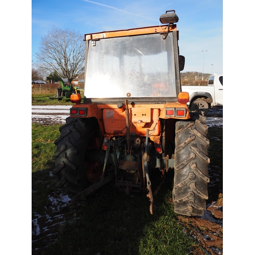 1662 - Kubota L4150 4wd tractor. Showing 5082 hours. C/w hydraulic shuttle, Kubota loader and spike. Key in... 