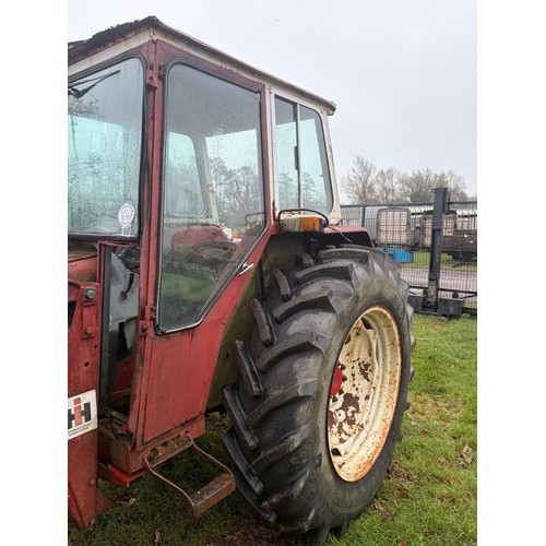 1656A - International 674 tractor. Brakes are worn.  Key in office