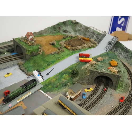 31 - Model railway N gauge track layout and various accessories to include Graham Farish locomotive 78