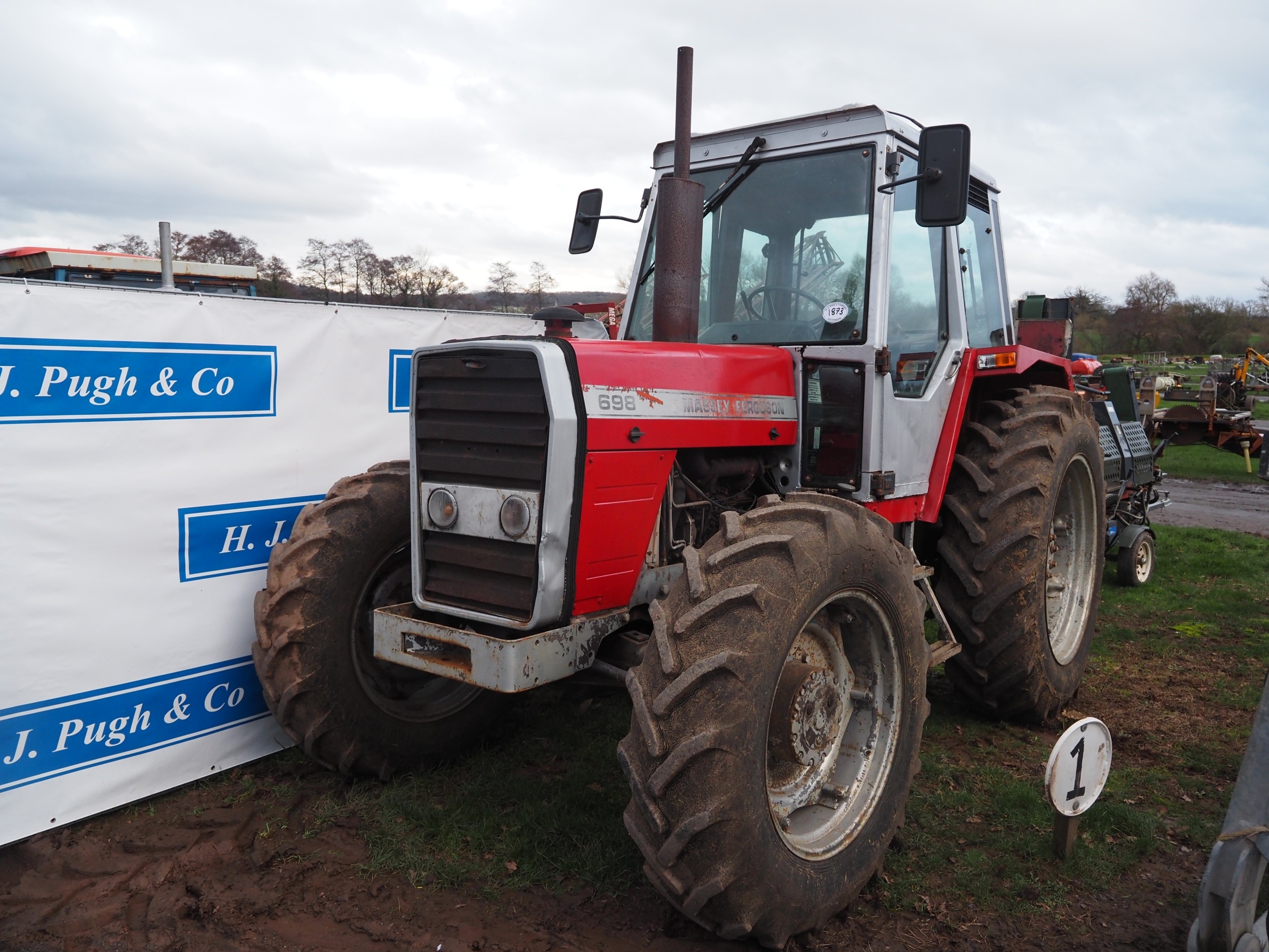 Massey Ferguson 698 4WD tractor. Runs and drives, brakes need attention ...