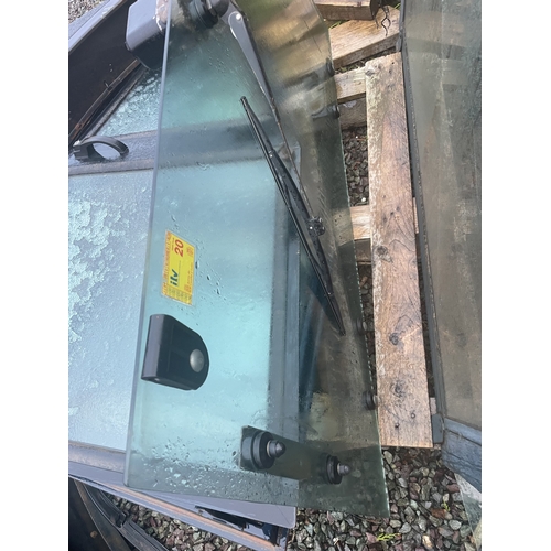 Front opening window for Sekura cab with working wiper motor