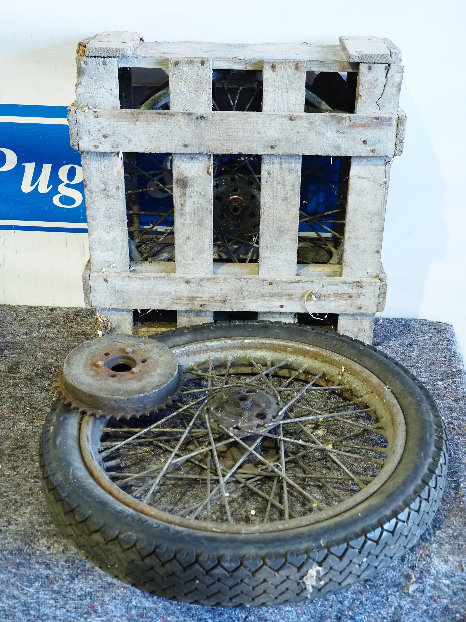 Early British motorcycle wheels, 1 in original shipping crate