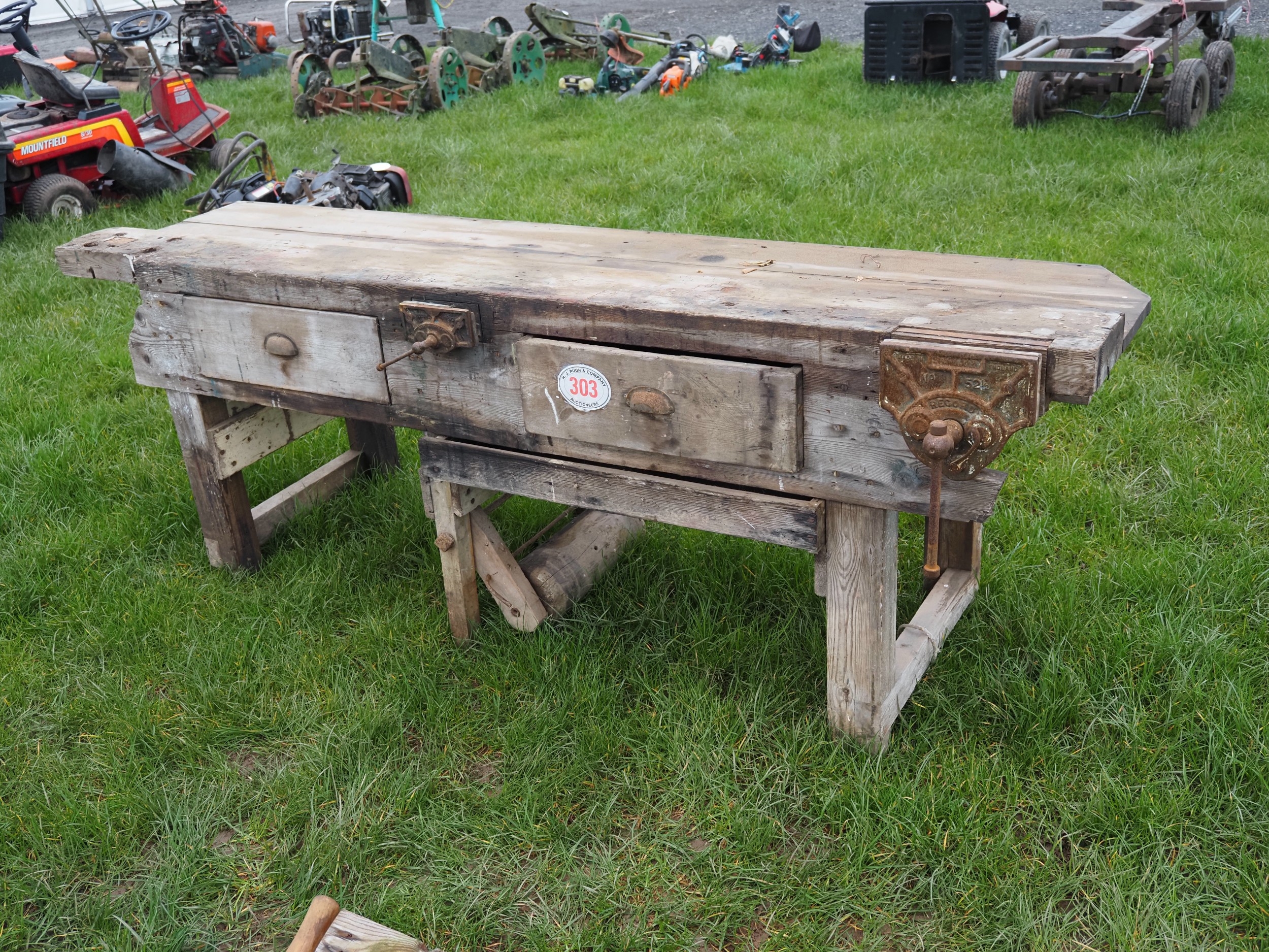 Wooden workbench with vices