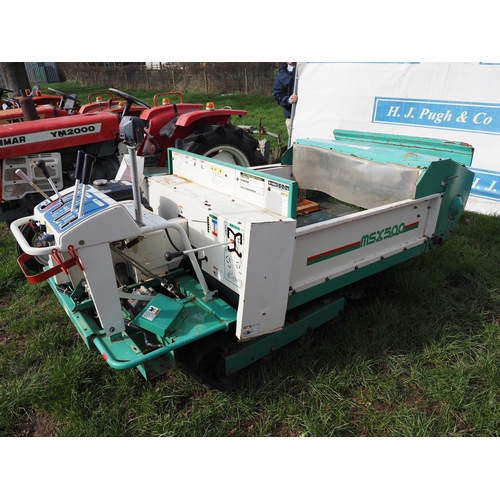 2029 - MSX Tracked rear discharge spreader. Key in office